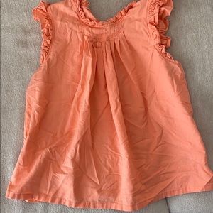 Ruffled sleeveless top